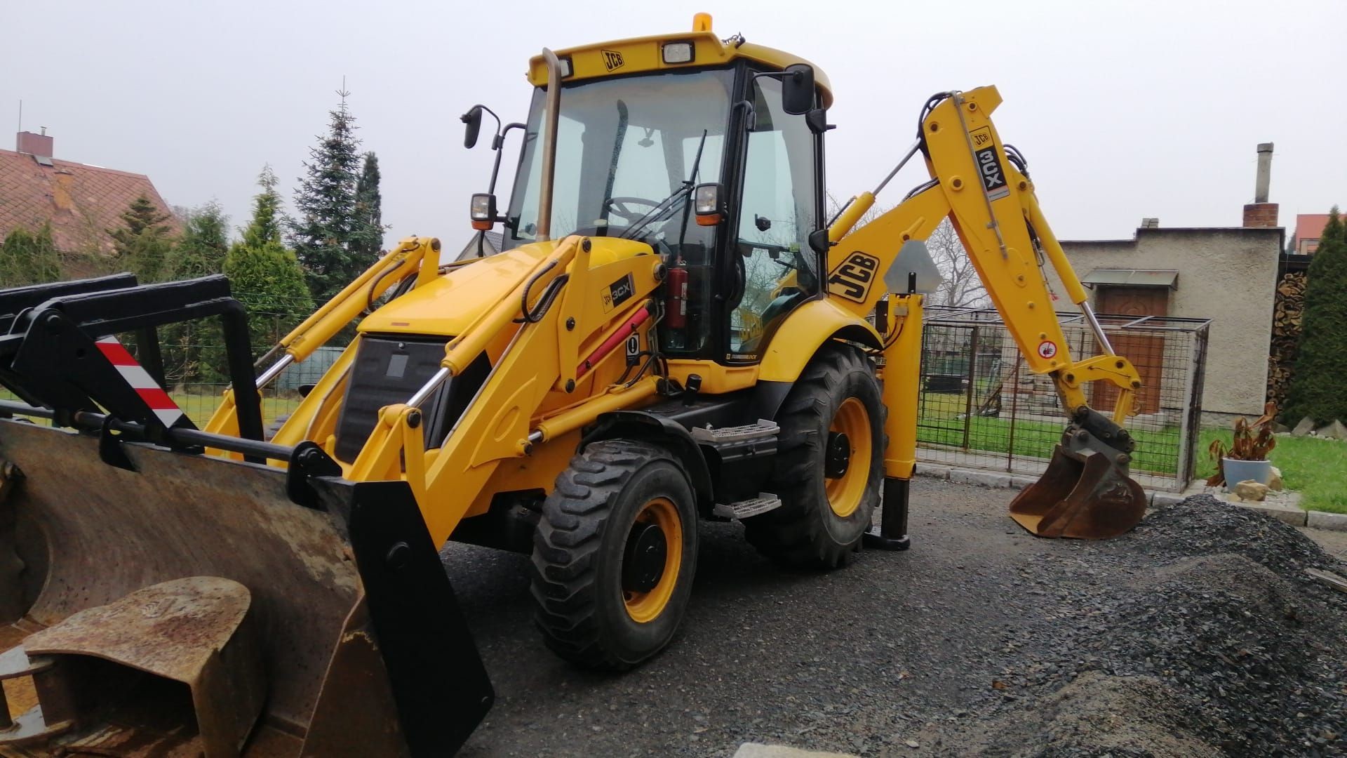 Bagr JCB 3CX pro výkopové a zemní práce.